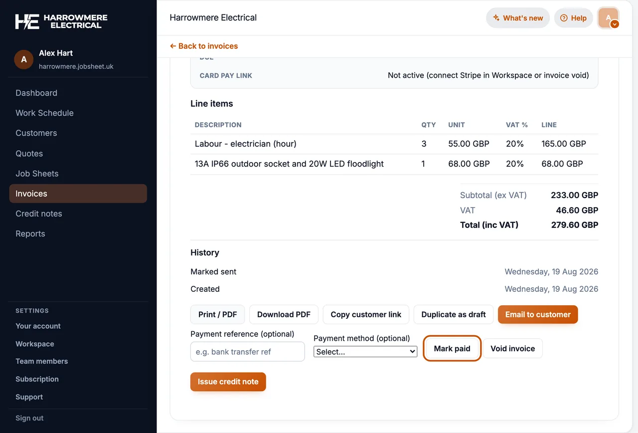 Invoice with Mark paid on a computer