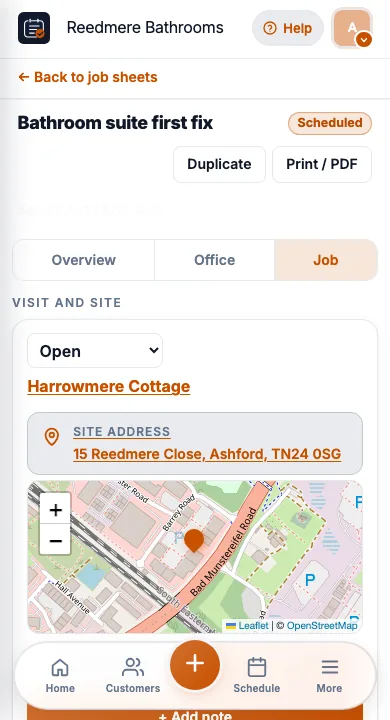JobSheet job sheet on a phone for bathroom fitters on site